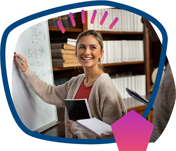 teacher writing on whiteboard